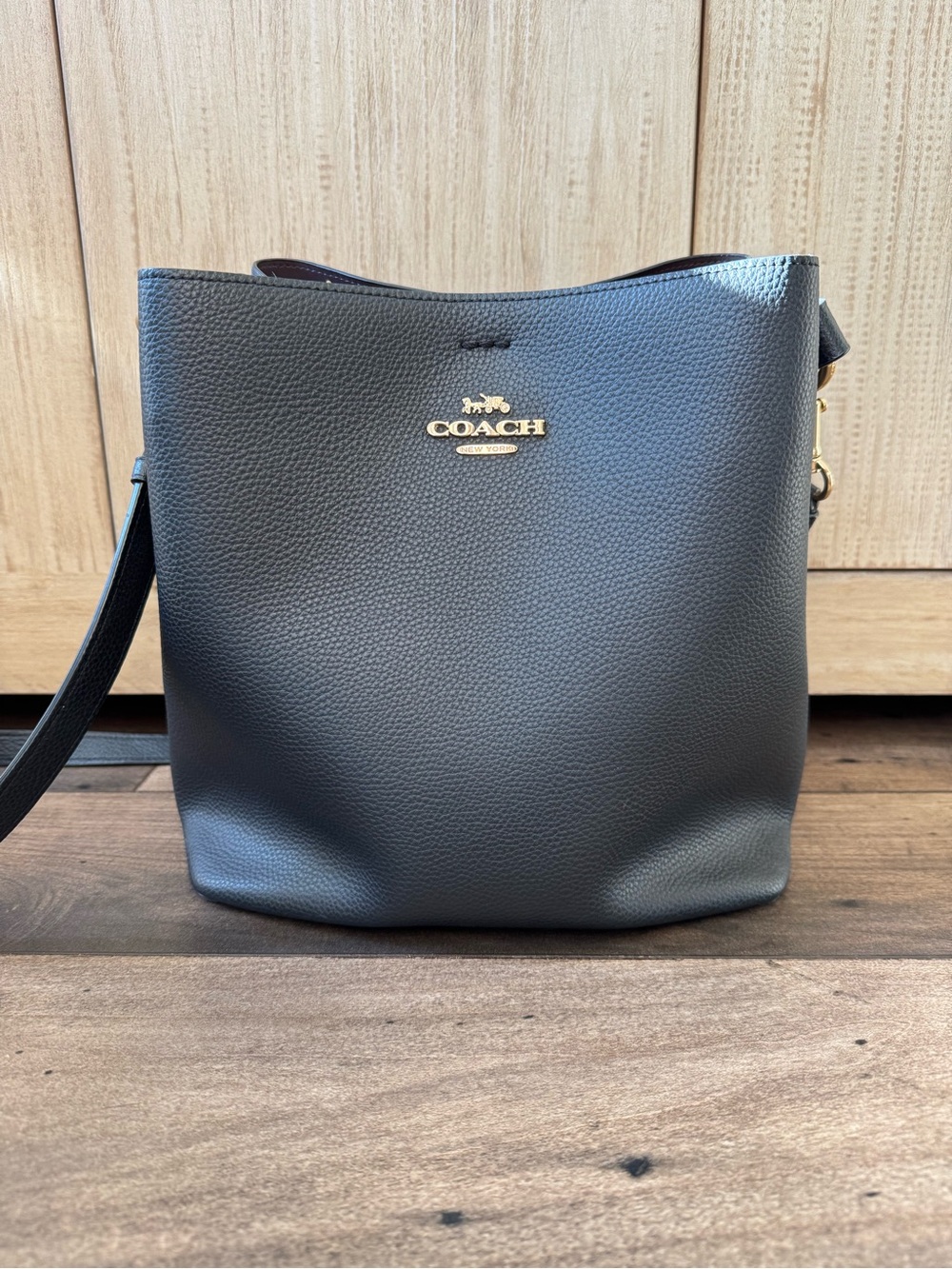 Coach Pebbled Leather Crossbody Bucket Bag in Black